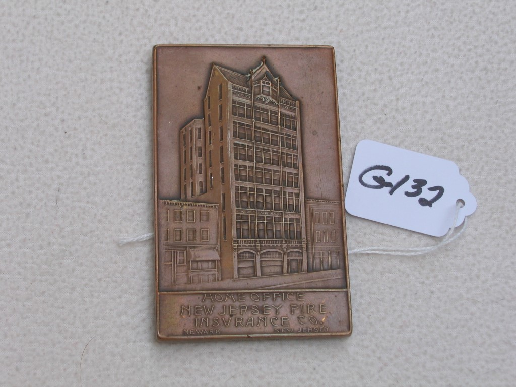 Brass Paperweight. Bottom Front says "Home Office